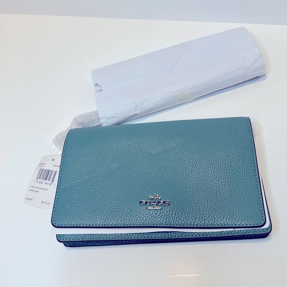 Coach Handbags - COACH Foldover Crossbody Clutch Aqua Brand New With Tag.